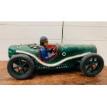 Large model of vintage racing car and driver