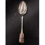 A Hallmarked silver serving spoon, 1836 makers mark William Johnson.