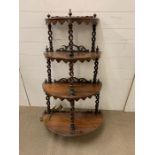 A four tier free standing shelf (H110cm)