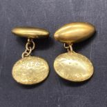 A pair of 15 ct gold gents cuff links (9.8g)