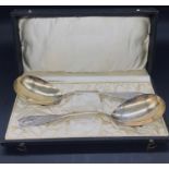 A Boxed set of white metal Bowl Shaped serving spoons
