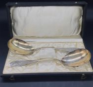 A Boxed set of white metal Bowl Shaped serving spoons