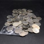 A good quantity of Commemorative 50 pence pieces, many uncirculated, Beatrix Potter etc.