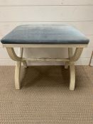 Dressing table stool with upholstered blue seat