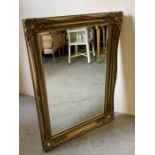 A gilt mantle/wall mirror (W92cm x H64cm)