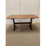 An oak kitchen table (H72cm W153cm D76cm)
