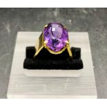 An Amethyst cocktail ring, marked 15 ct gold