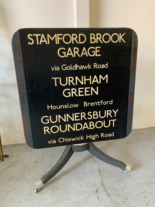 Tilt top table decorated with vintage London bus sign (H90cm W70cmsq)