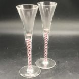 Two Georgian Coloured air twist cordial glasses