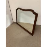 A wall hanging mirror