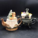 Two teapots from The Disney Character Teapot Collection, "Lady and the Tramp" limited edition 2372/