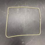 A 9 ct gold necklace in a rope style (3.7g)