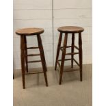 A pair of oak bar stools