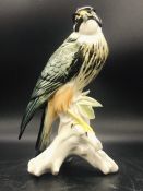 A Porcelain figure of a Hawk.