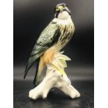 A Porcelain figure of a Hawk.