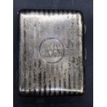 A Hallmarked silver card and cigarette case