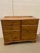 Pine chest of drawers with six small drawers and two large drawers (H88cm W112cm D45cm)