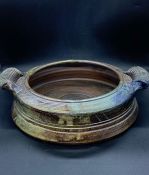 Studio pottery dish with rimmed handles to sides. Dia35cm H10cm