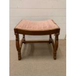 An oak dressing table stool