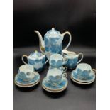A china tea set with a floral theme