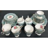 A part tea set made by Royal Albert Bone China in the pattern 'Enchantment'