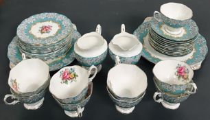 A part tea set made by Royal Albert Bone China in the pattern 'Enchantment'