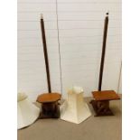 Pair of wooden hand carved floor standing lamps with elephant seat or table. H158cm W38cm
