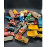 A selection of Diecast trucks and work vehicles to include, Dinky, Matchbox, etc