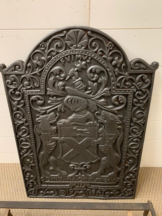 A cast iron fire place back plate, cast with a coat of arms along with grate and fire dogs (H77cm - Image 2 of 2