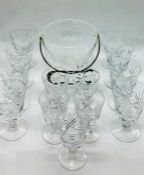 A selection of cut glass crystal glasses and ice bucket