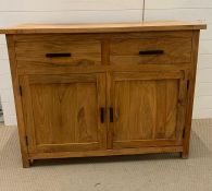 A hardwood sideboard with two drawers and cupboard under (H90cm W115cm D48cm)