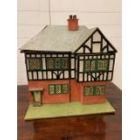 A vintage wooden dolls house