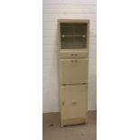 A late 50's single larder cupboard with three cupboards and one drawer (H170cm W44cm D38cm)