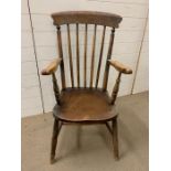 A Victorian beech and fruitwood slat back armchair