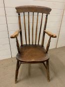 A Victorian beech and fruitwood slat back armchair