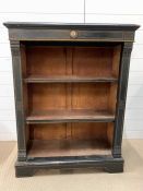 An Ebonised bookcase 105 cm tall x 83 cm wide by 36 cm deep