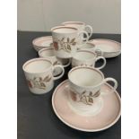 Eight Susie Cooper bone china cups and saucers