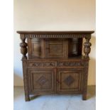 An oak buffet sideboard (H128cm W122cm D43cm)