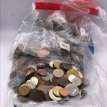 A large quantity of foreign coins (about five kilos)