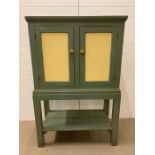 A painted cabinet on stand with shelf under (H150cm W100cm D50cm)