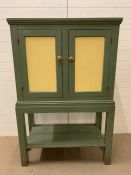 A painted cabinet on stand with shelf under (H150cm W100cm D50cm)