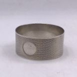 A Hallmarked silver napkin ring.