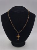 A 9ct gold cross on a 9ct gold chain (7.4g)