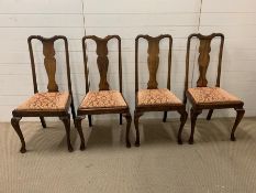 A Set of Four Oak Dining Chairs