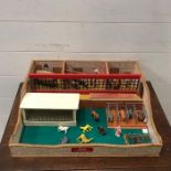 A vintage wooden Zoo play set with some animals