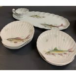 Porcelain de Sologne Limoges eight place fish set to include plates, serving platter and jug.