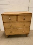 A small pine two short over two long chest of drawers (H86cm W84cm D42cm)