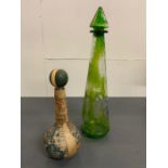 Two decorative glass bottles