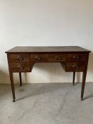 A dressing table on castors (H86cm W114cm D55cm)