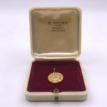 A Paul Vince 9 ct gold St Christopher (2.7g)